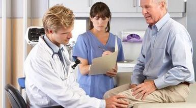 Patient with arthritis while inspection of an orthopedic